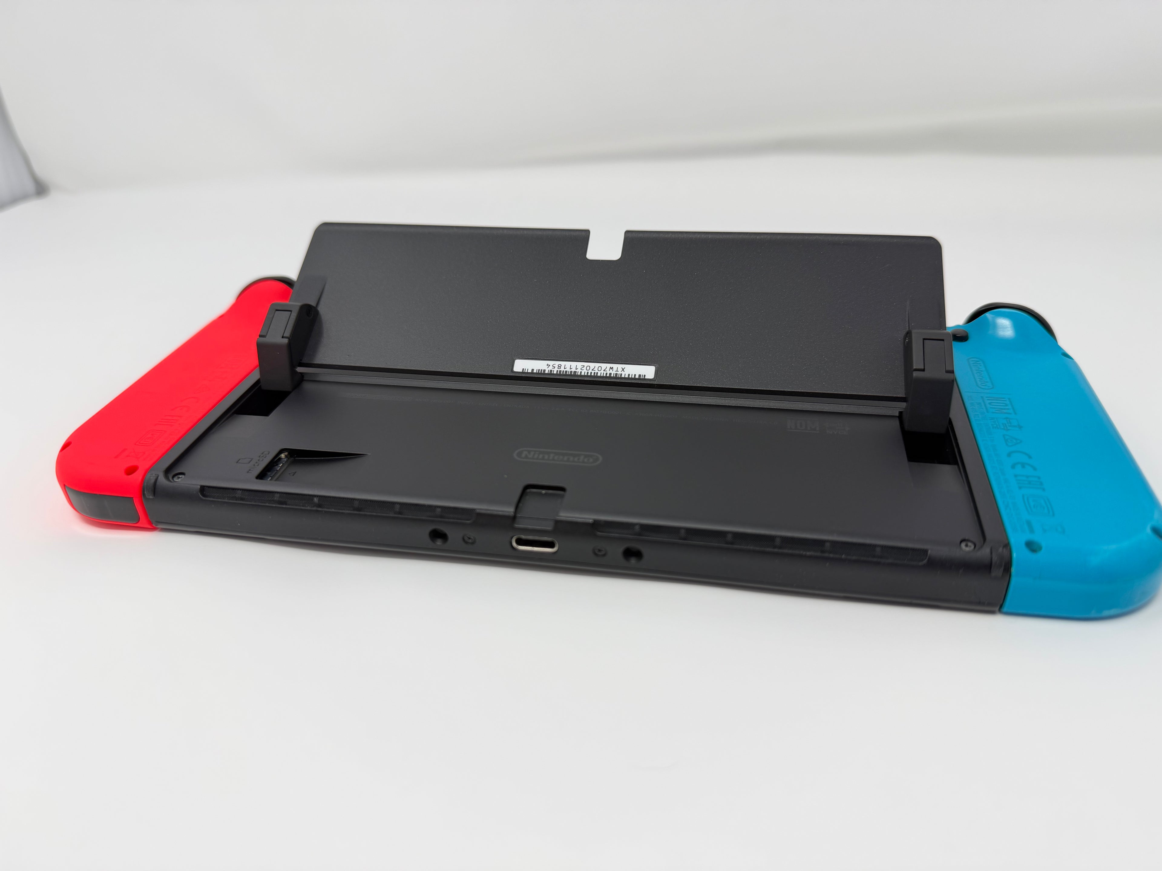 Nintendo Switch OLED Console with Blue and Red Joy-Cons 64GB