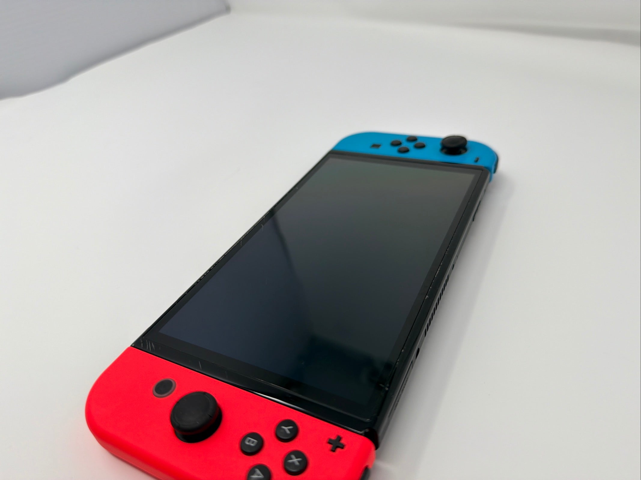 Nintendo Switch OLED Console with Blue and Red Joy-Cons 64GB